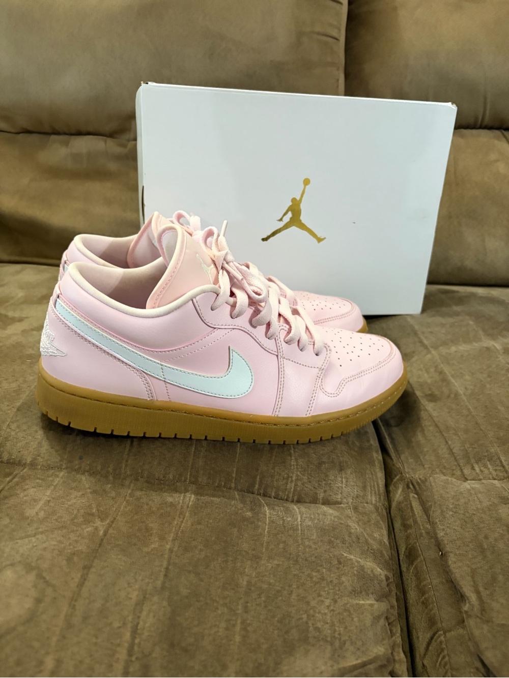 Jordan Low Top Sneakers in Light Pink with White Swoosh and Gum Sole